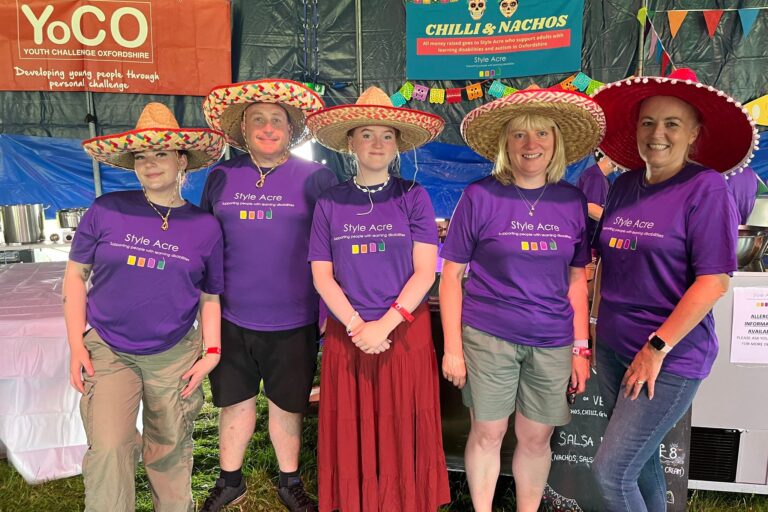 A group of event volunteers at Truck Festival in the charity tent