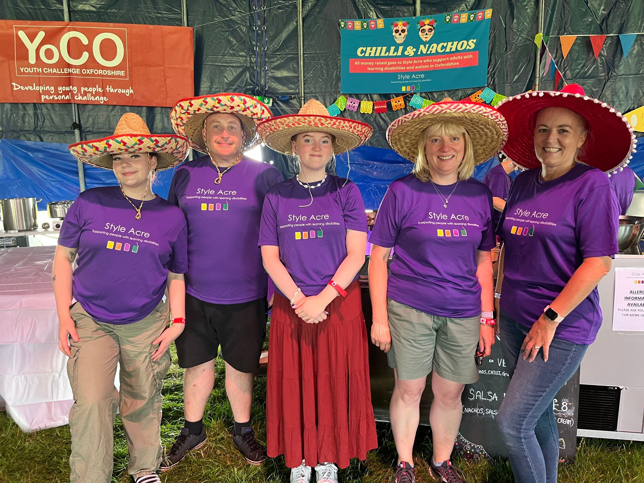 A group of event volunteers at Truck Festival in the charity tent