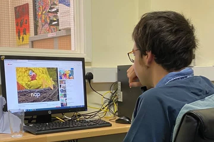 A gentleman enjoying time on the computer - communication and technology