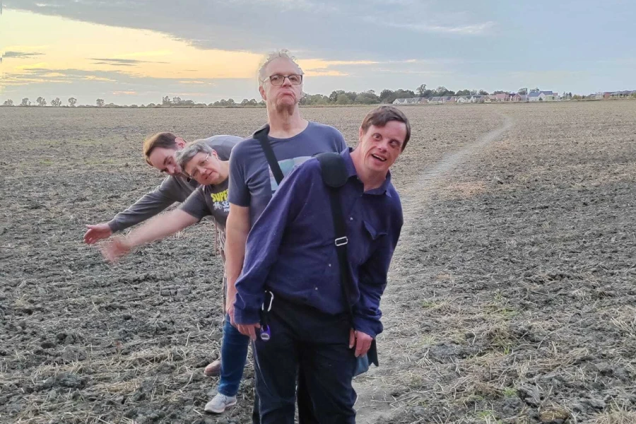 Enjoying outside walks and activities with Ways to Wellness programme in Oxfordshire A group of people enjoying a walk in the countryside with the Ways to Wellness programme in Oxfordshire