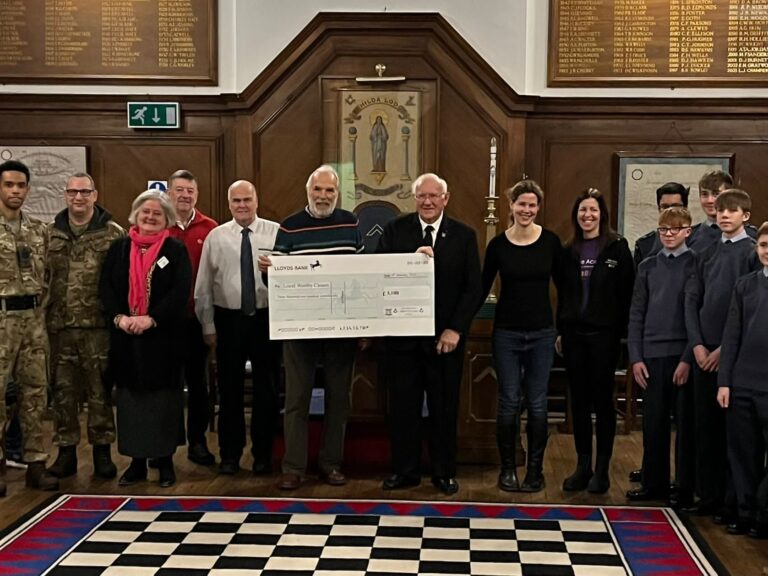Visiting the Freemasons in Wallingford A group or charities at the Freemasons in Wallingford collecting a cheque