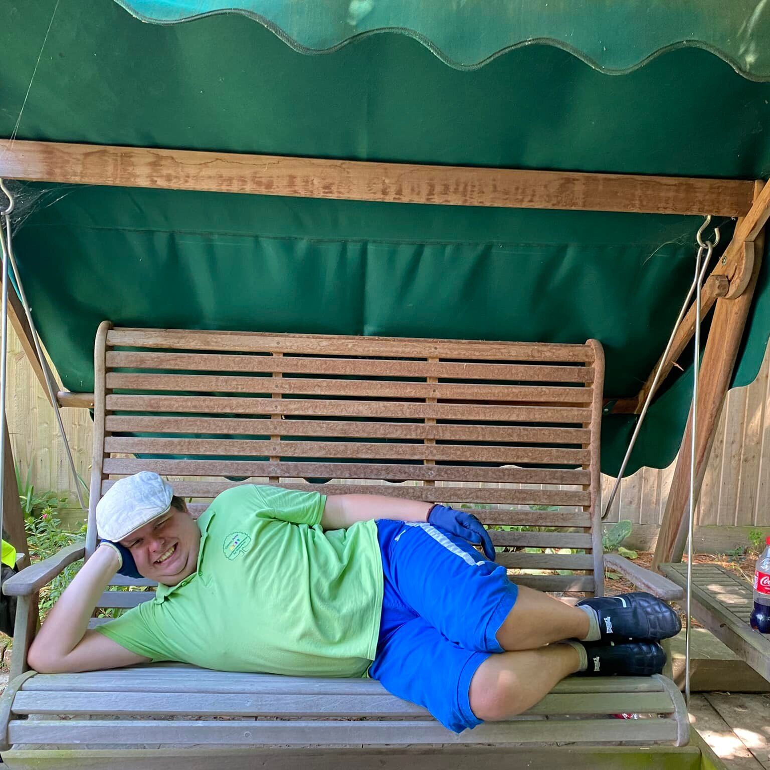 Man lying on garden swing chair - Green Acre Garden Maintenance in Wallingford Didcot