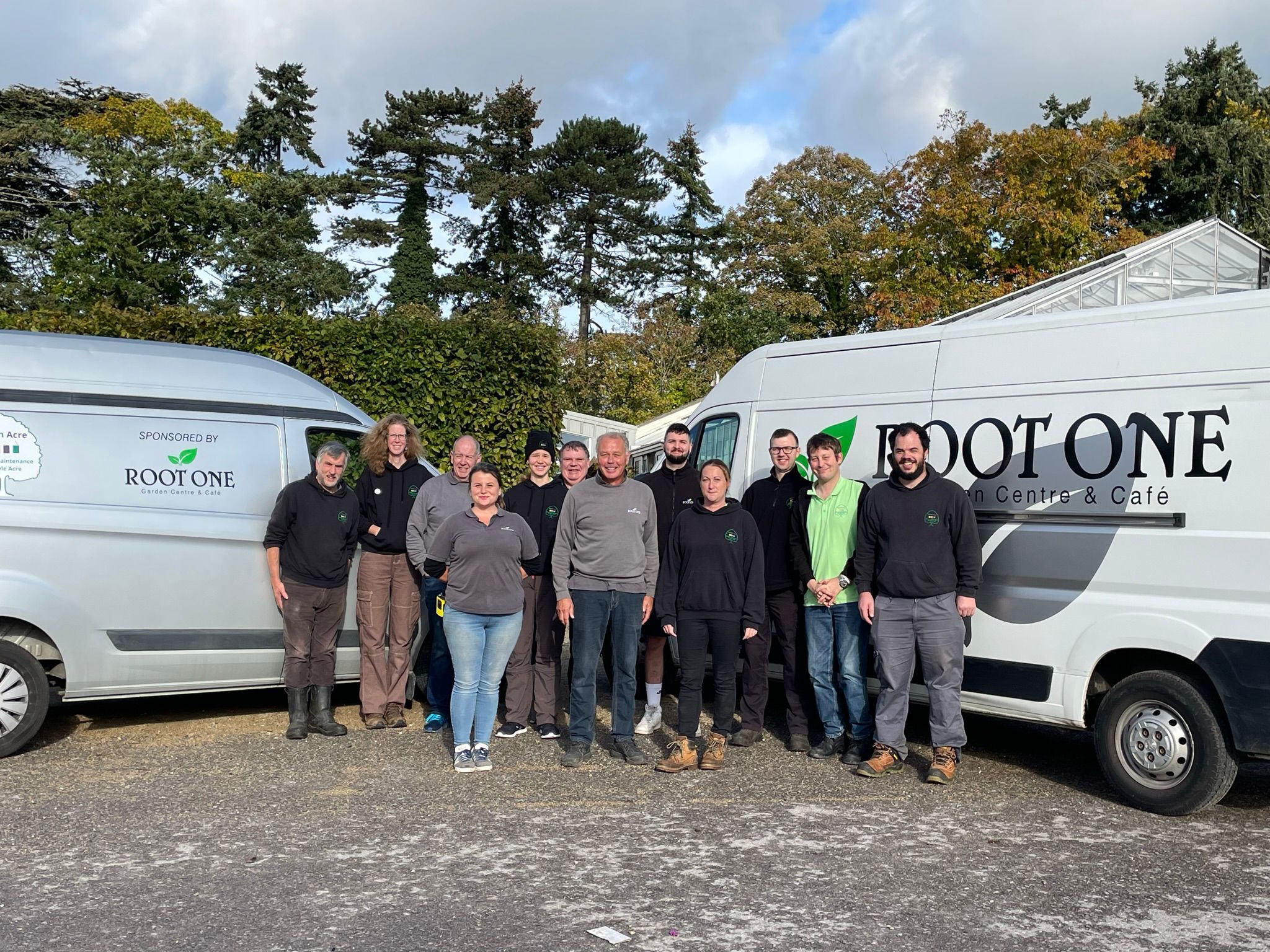 Green Acre team People from the Green Acre Garden Maintenance team and Root One team stood in front of the Green Acre Van