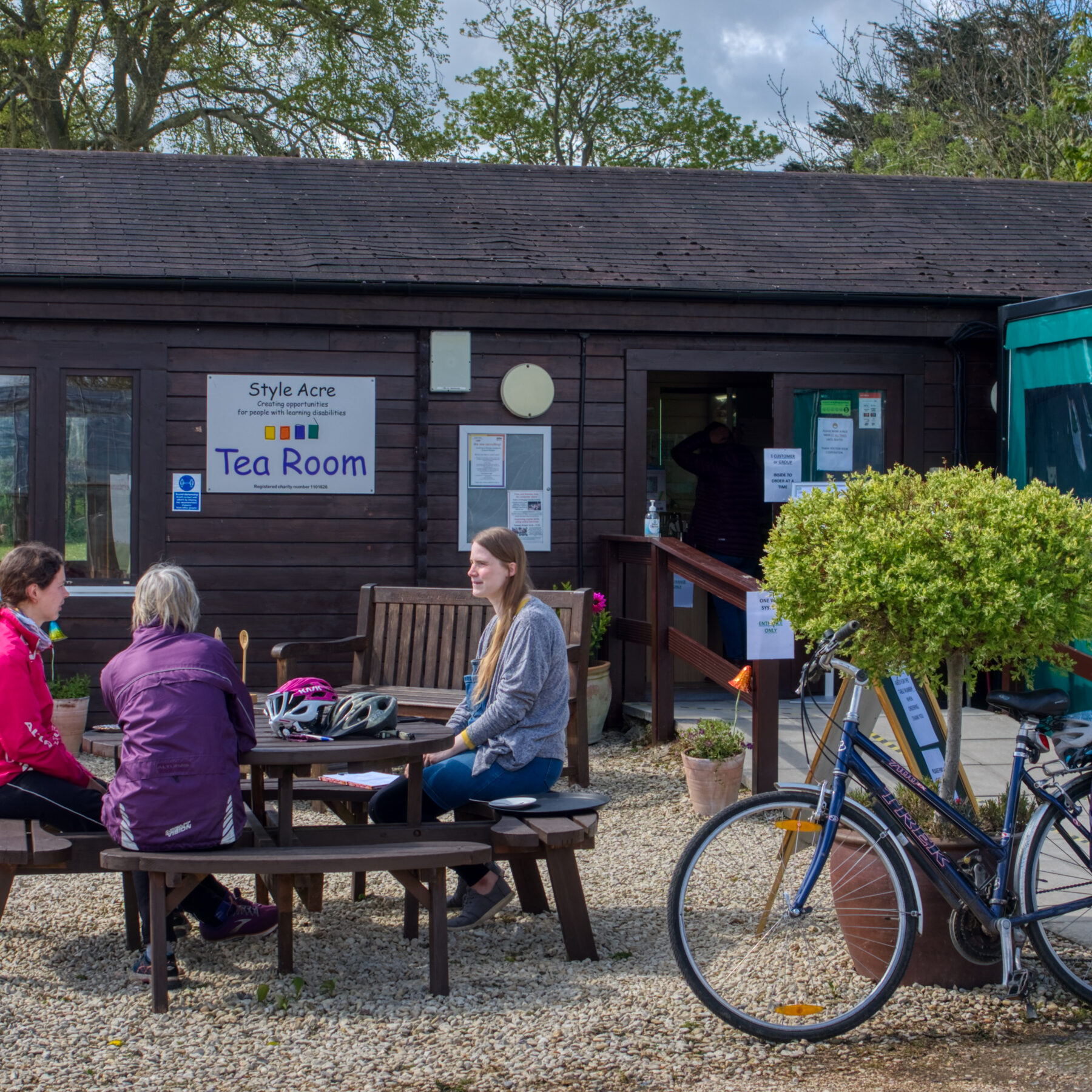 People enjoying the outside seating area at the Style Acer Tearoom, Savages, Blewbury