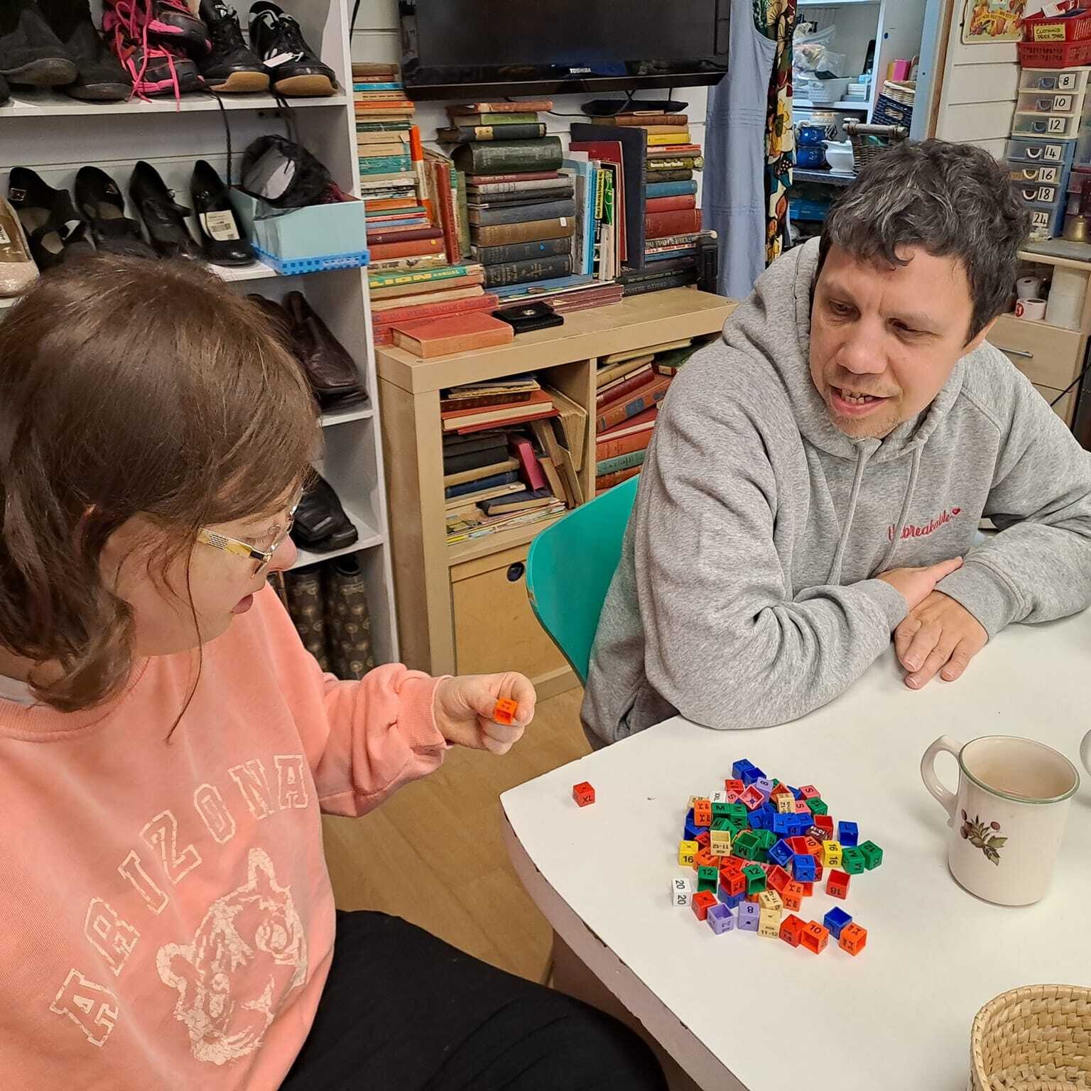 Two people working at the Charity Shop - Employment support in Oxfordshire, Style Acre