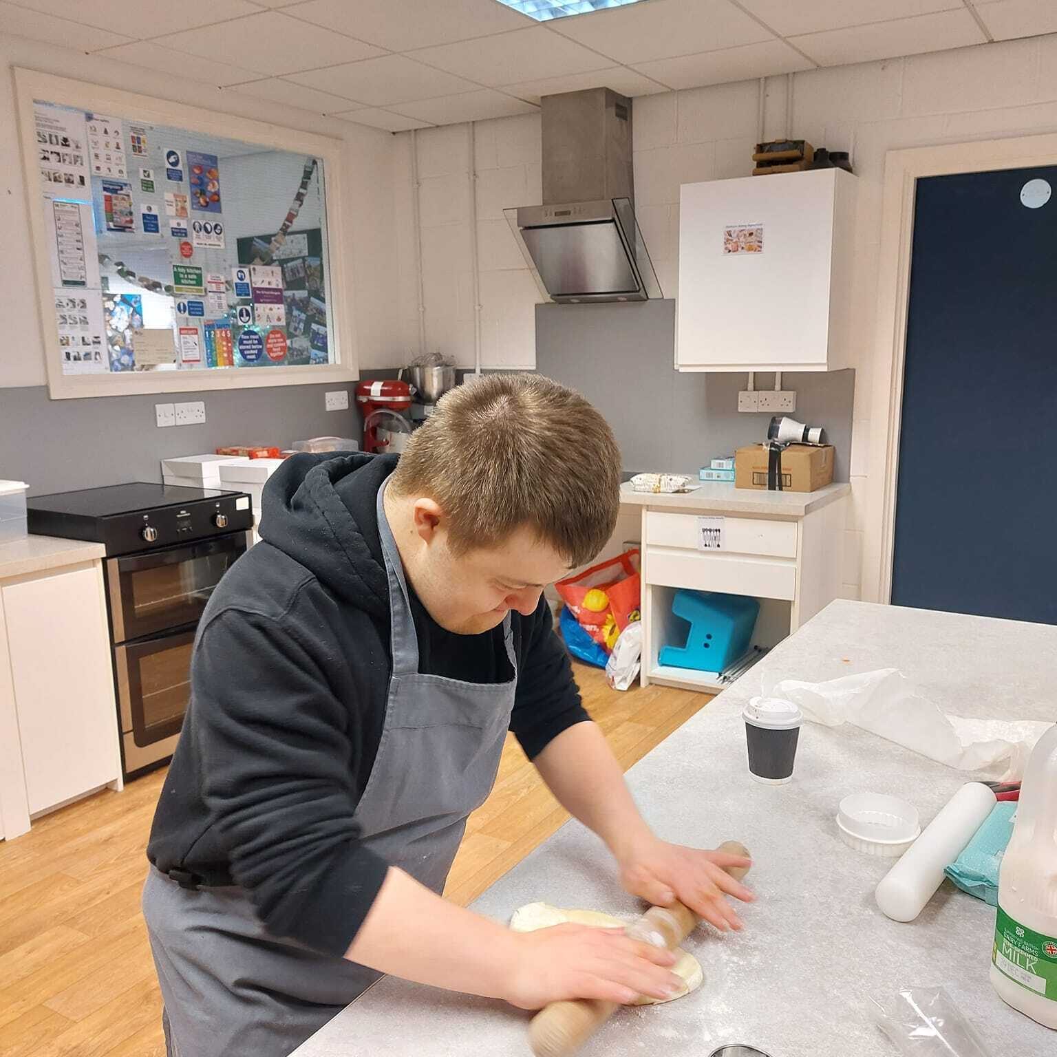 A gentleman rolling pastry at T2 Community Hub - Style Acre community hubs in Oxfordshire