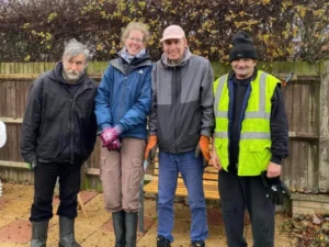 A group of gardeners learning new skills with Green Acre supported work programme