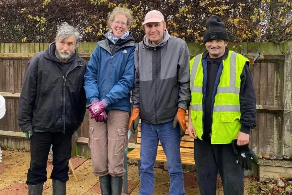 A group of gardeners learning new skills with Green Acre supported work programme