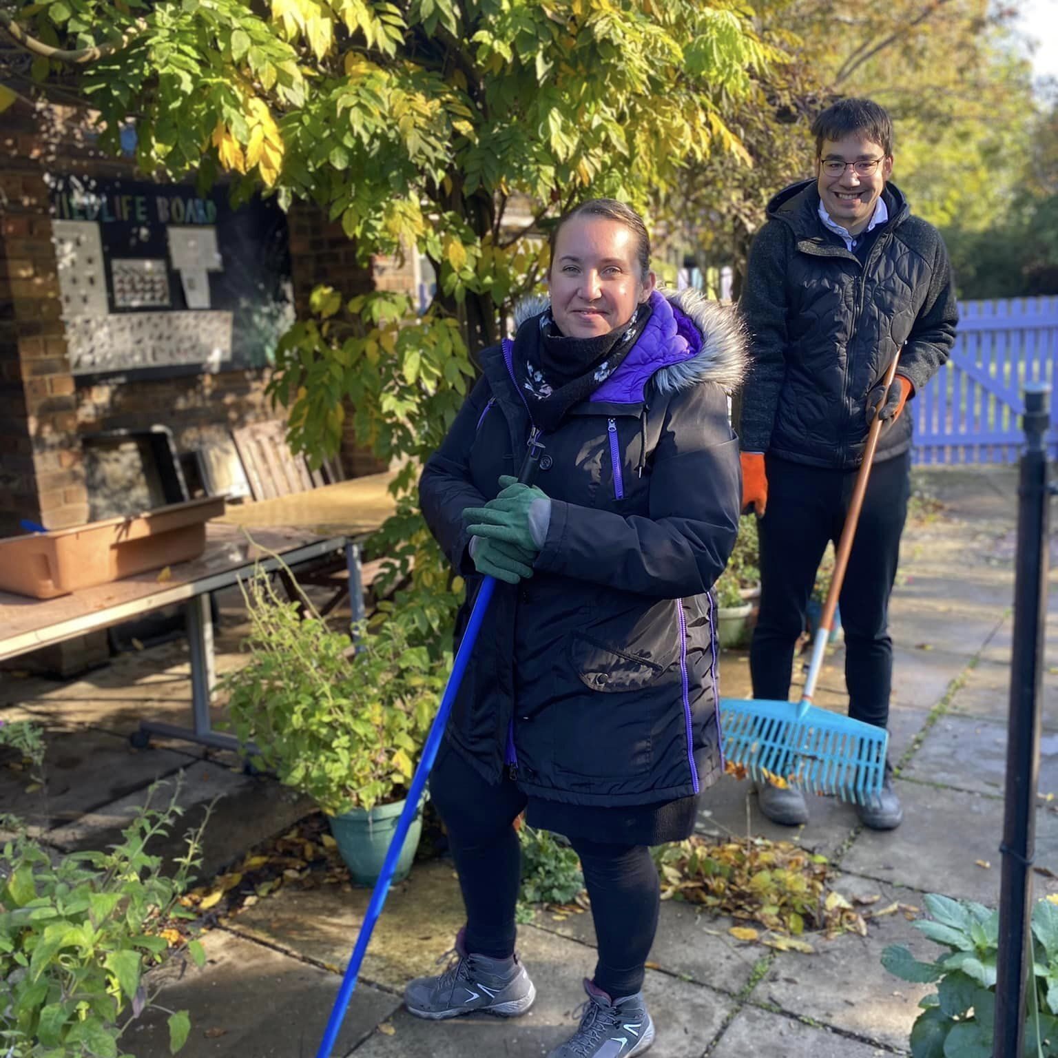 Two people taking leaves at the Wantage Market Garden project, Oxfordshire
