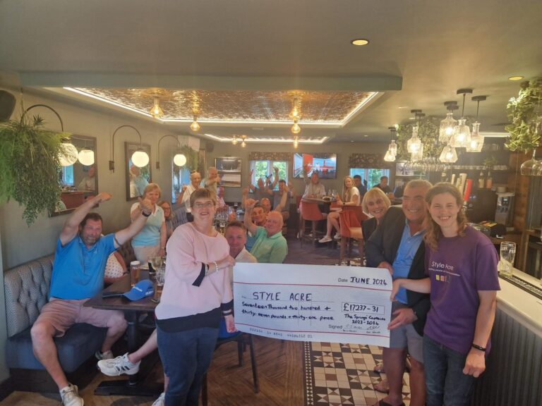 The Springs Cheque Presentation People from Style Acre at the Springs Presentation Evening with members behind