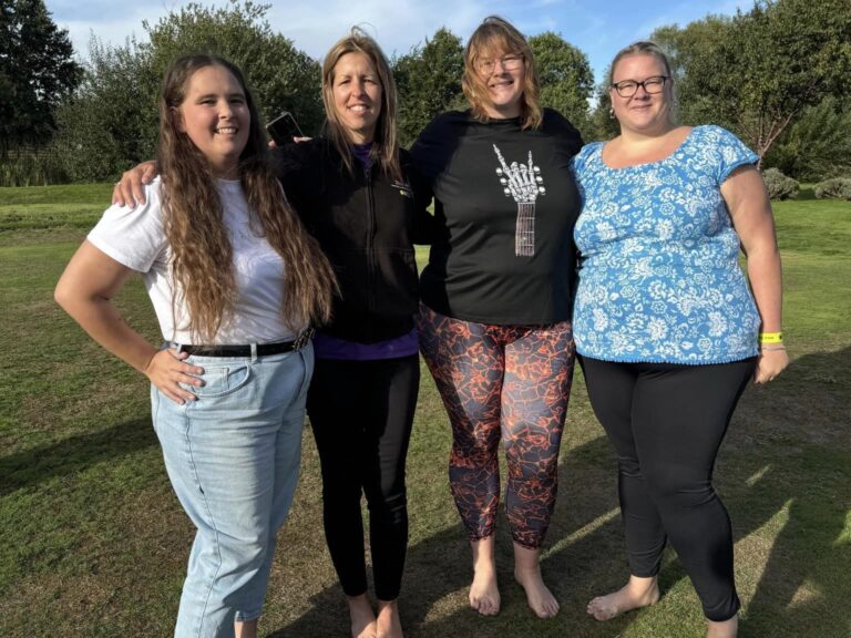 459325618_543825281538581_2339111139776241094_n Group of four ladies waiting to take on a Firewalk