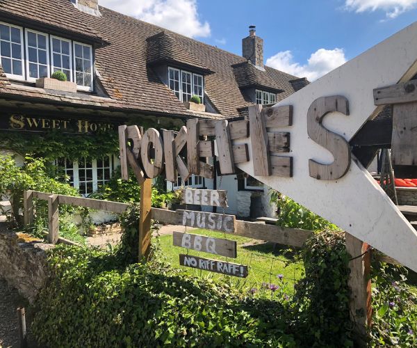 Square images for wesbite (600 x 500 px) (5) Rokefest sign infront of the Home Sweet Home Pub