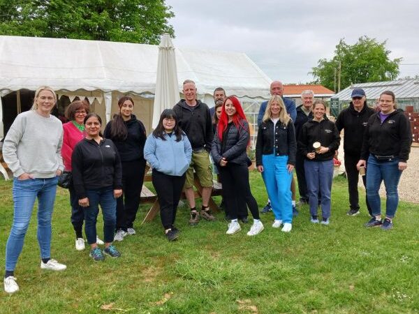 Square images for wesbite (600 x 500 px) Group of 15 volunteers from Natwest standing outside the tea room