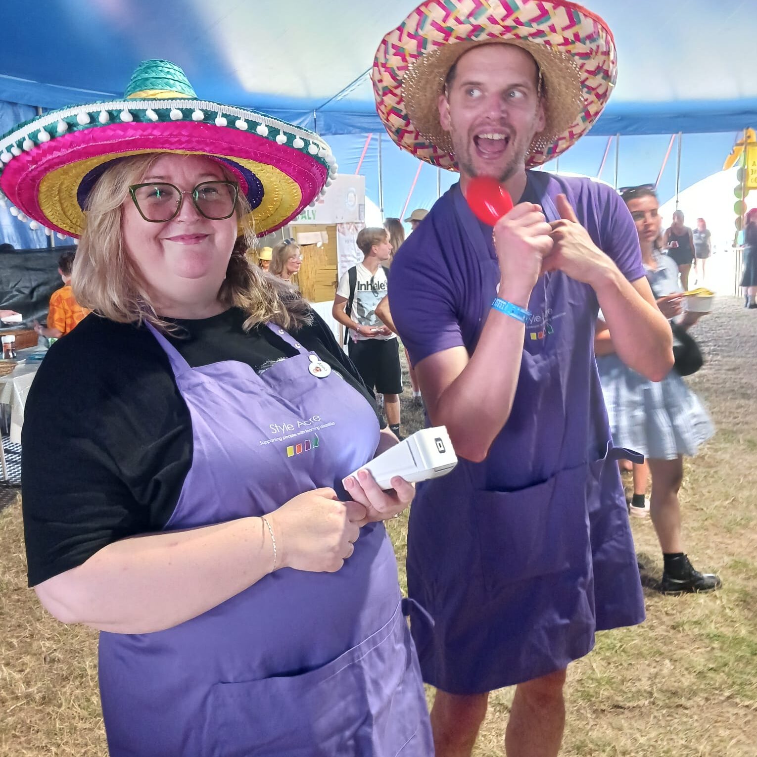 Two Style Acre volunteers having fun wearing Mexican Hats at Truck Festival