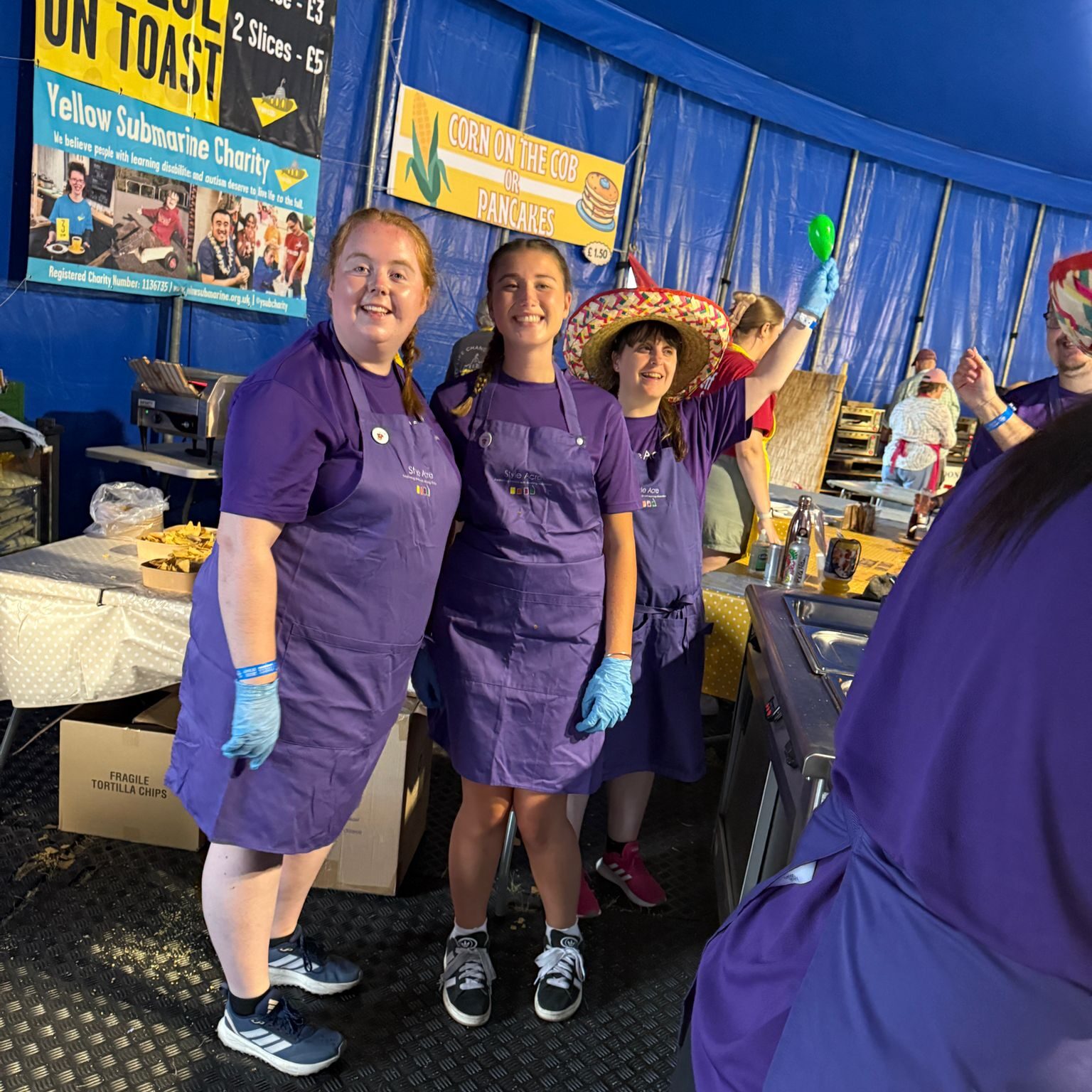 Style Acre volunteers behind the chilli and nachos stand at Truck Festival