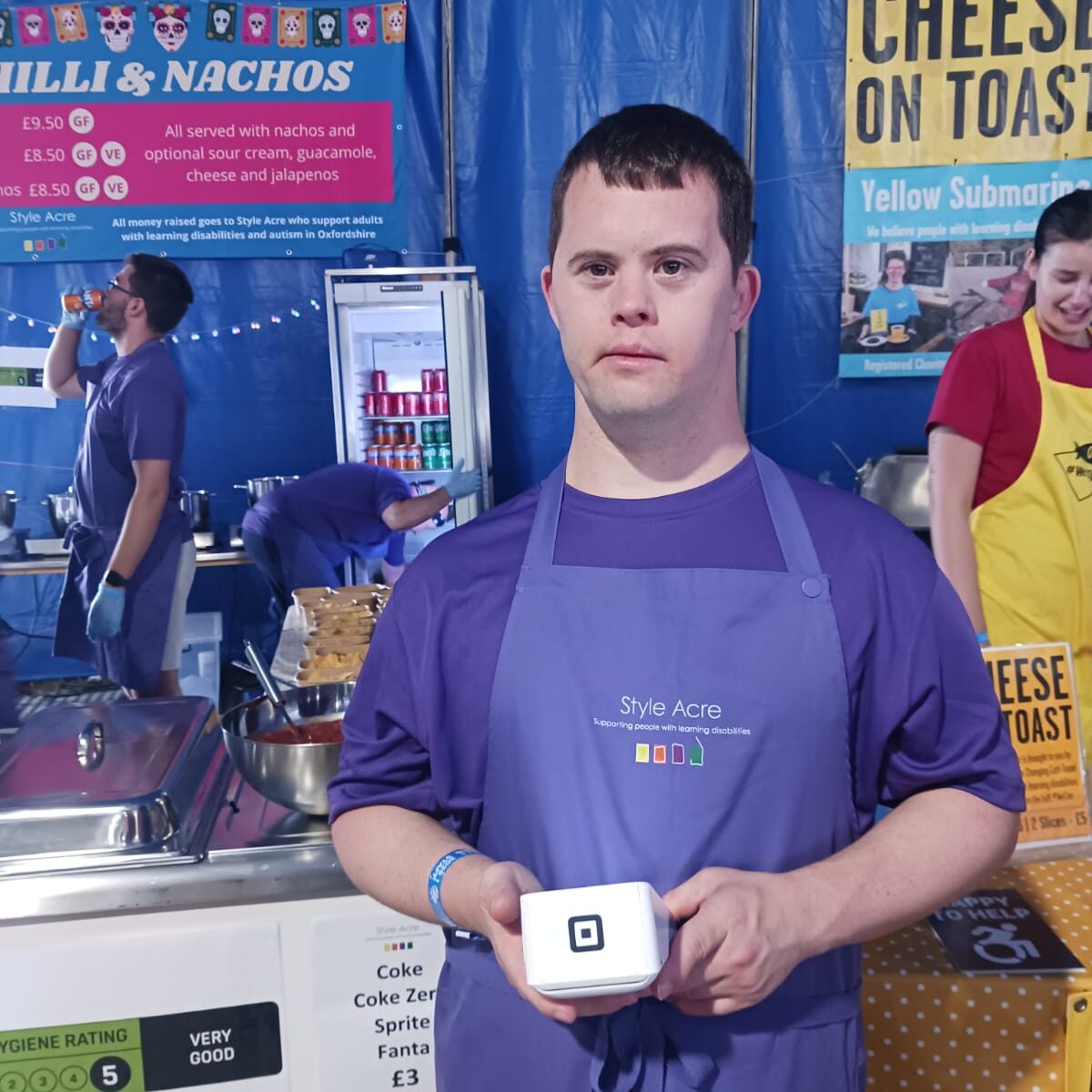 A Style Acre volunteer waiting to service people at Truck Festival