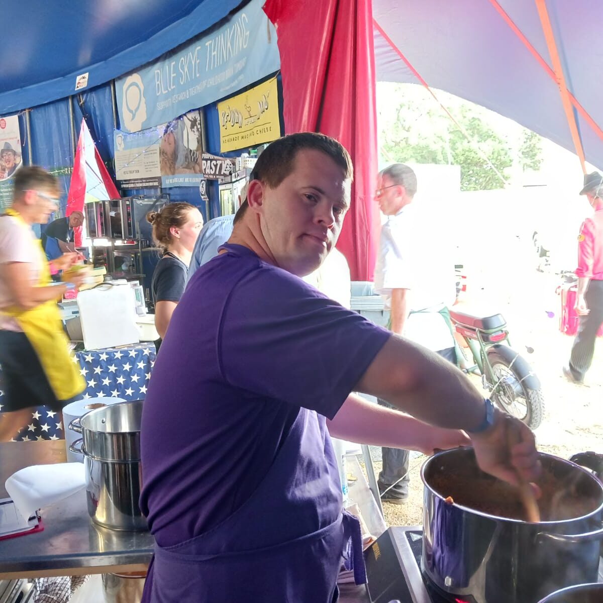A Style Acre volunteer cooking chilli at Truck Festival