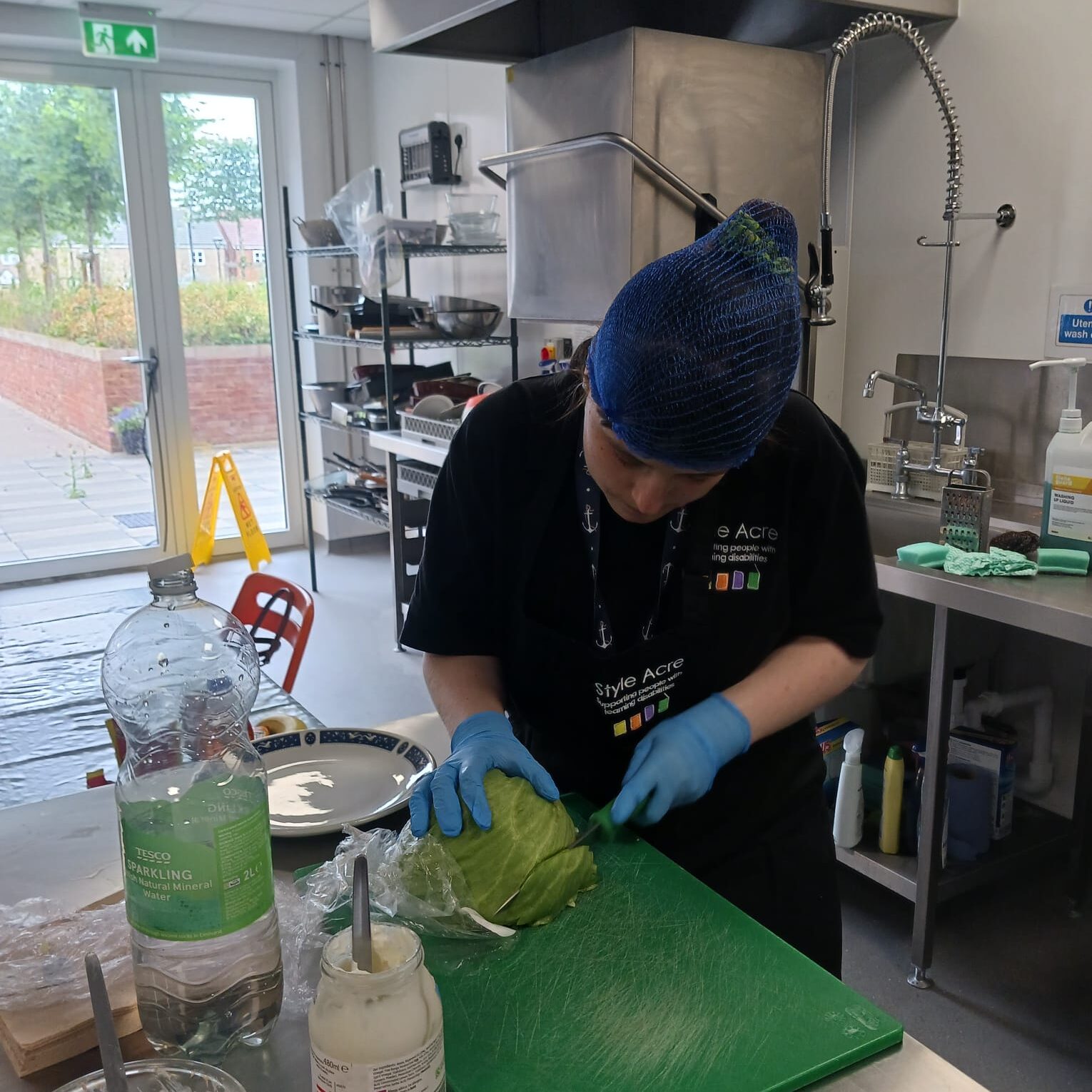 Preparing salad in the kitchen of Frances Curtis Court