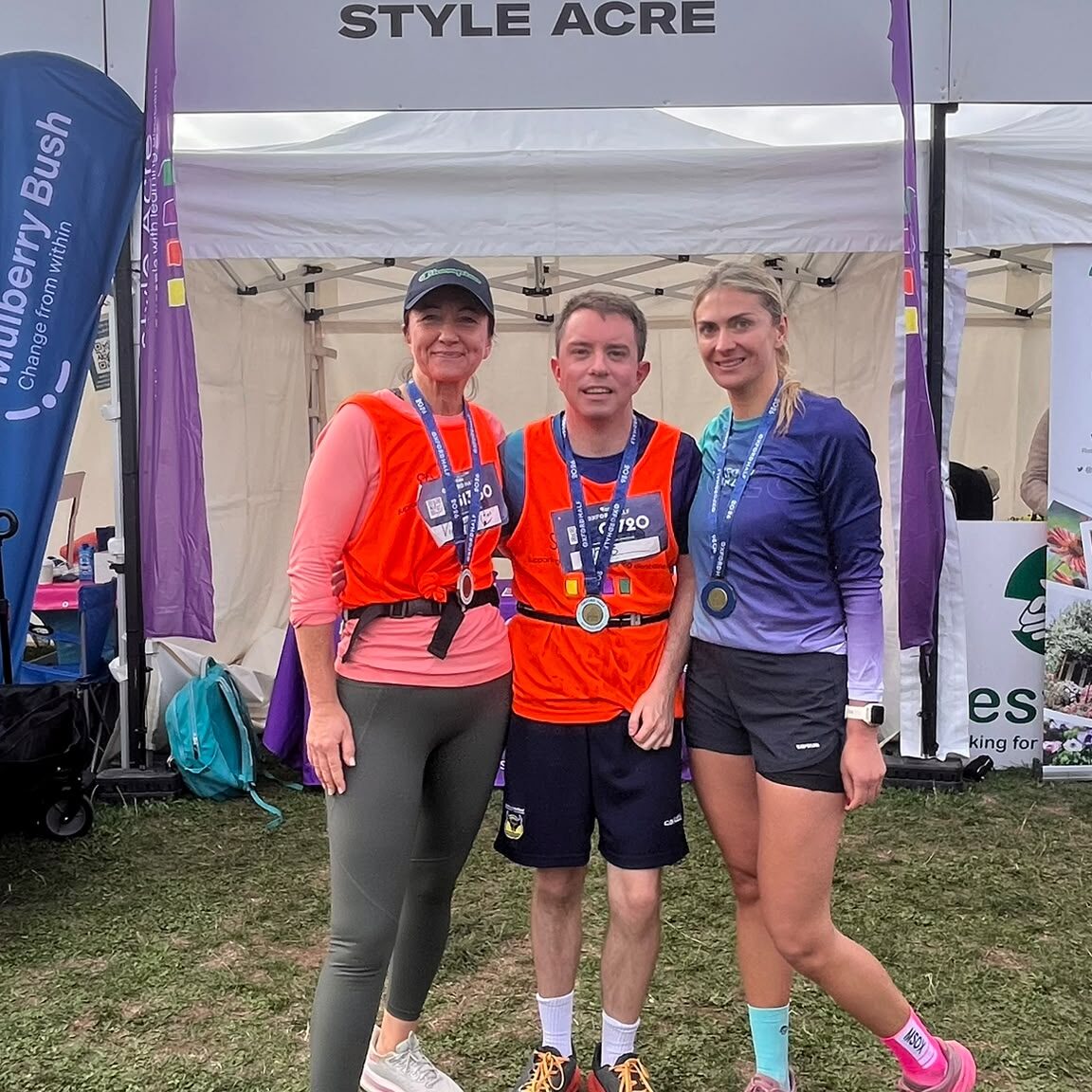 2 ladies and a man standing together after taking part in the Oxford Half Marathon 2026